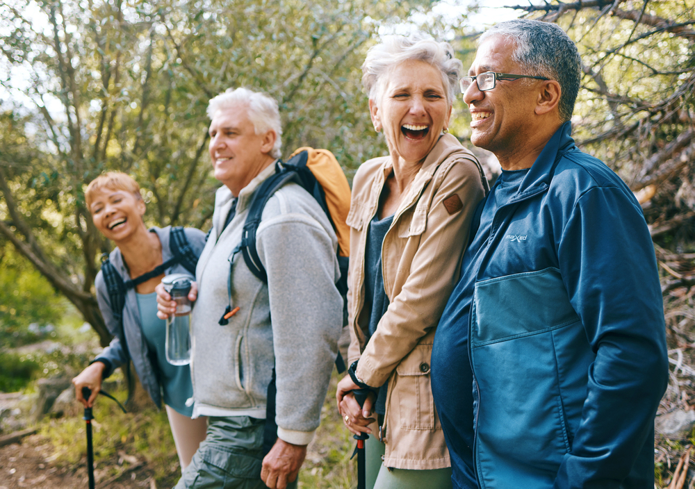 7 Signs It May Be Time To Plan Ahead For Future Care 1 healthy, active older adults enjoying a walk in the woods, representing the freedom to travel and explore when you plan for the future.