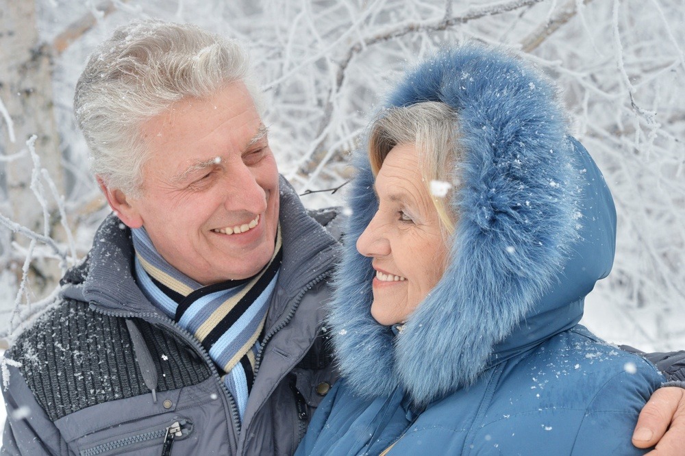 senior couple enjoying activities in the winter