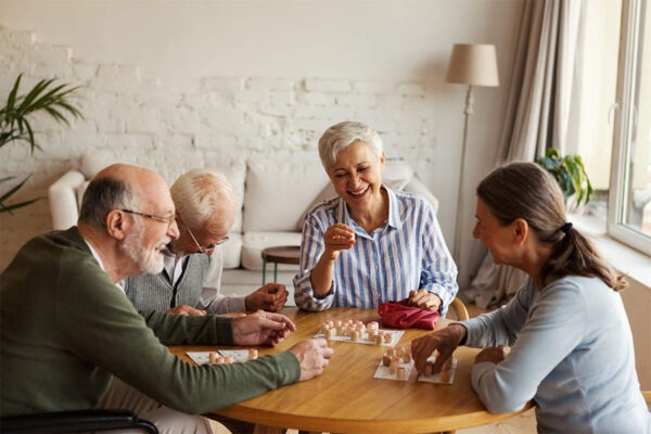 Group of seniors having fun playing bingo