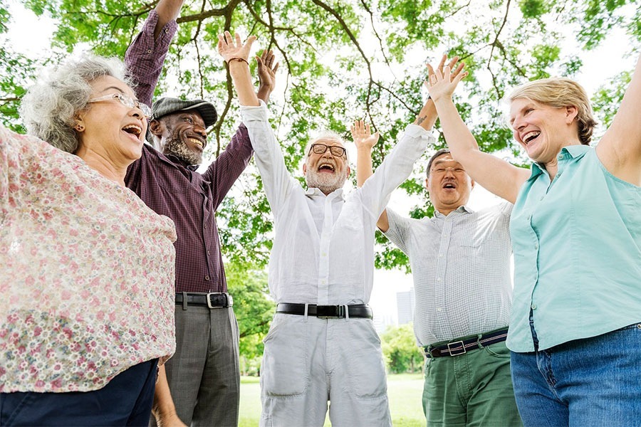 group of happy and healthy elder adults.