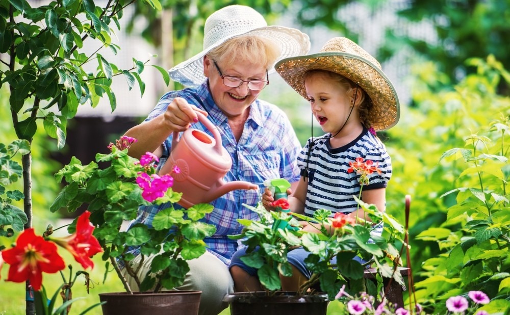 What Are Our Residents Looking Forward To The Most This Spring? 2 senior gardening with her grand daughter is one of the activities residents look forward this spring
