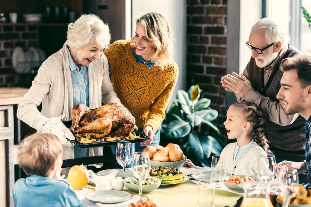 5 Tips To Stay Healthy During The Holidays 10 family having holiday dinner