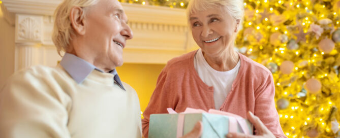 Exploring Seasonal Events At Riddle Village 1 seniors enjoying holiday activities together, representing warm and joyful senior holiday activities