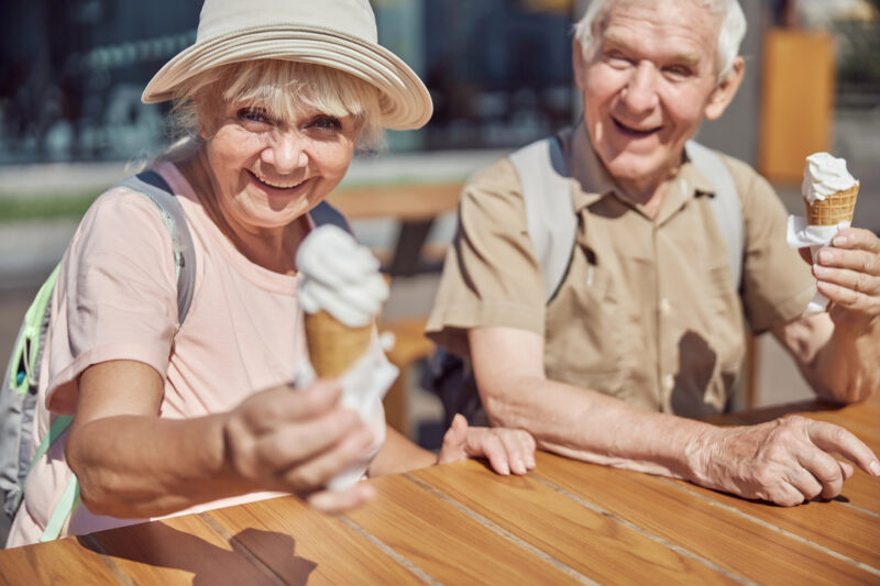 Residents enjoying ice cream at a social event, one of the many senior summer activities offered at Riddle Village
