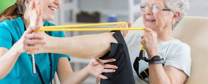 Short-Term Rehabilitation For Seniors: What To Expect 8 a senior woman exercising with therapist, illustrating short-term rehab for elderly near me